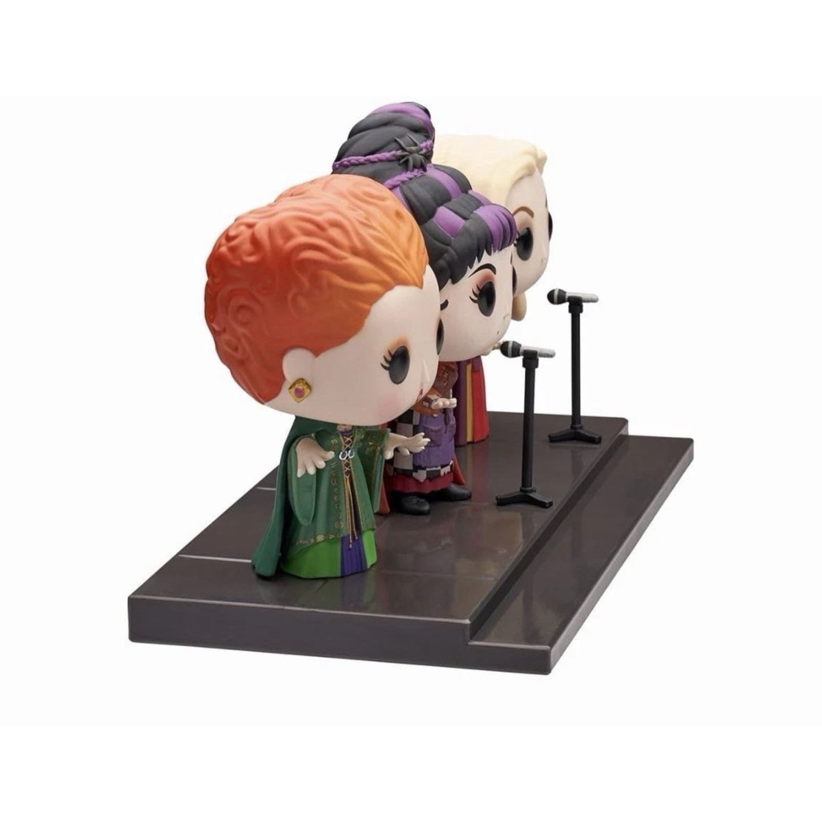 Side view of  Funko Pop Movie Scene Hocus Pocus Sanderson Sisters figurines on a black stand against a white background