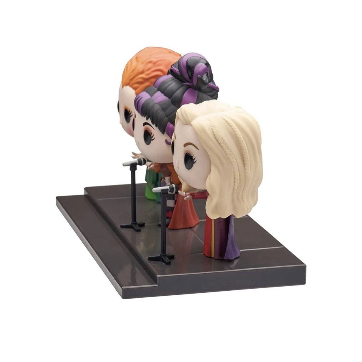 Side view of Funko Pop Movie Scene Hocus Pocus Sanderson Sisters figurines on a black stand against a white background